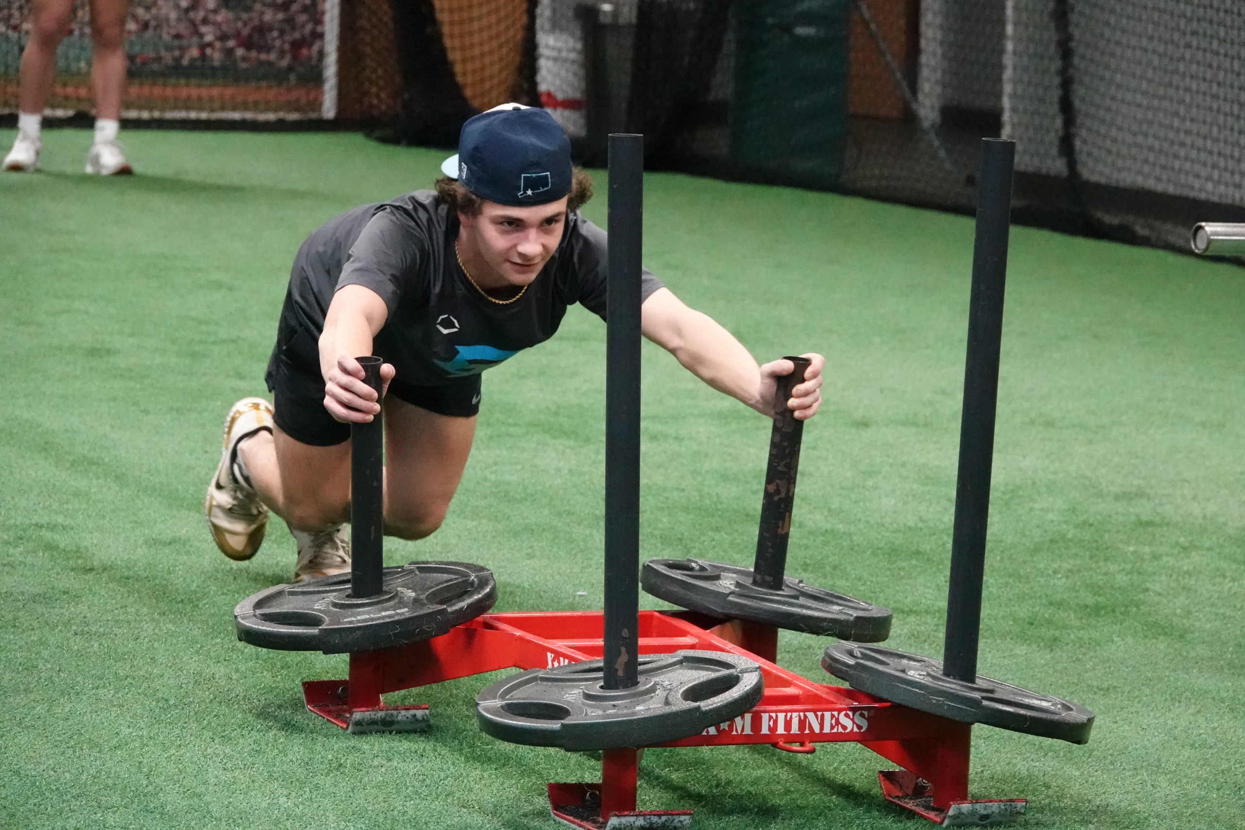 Athlete Pushing Weights